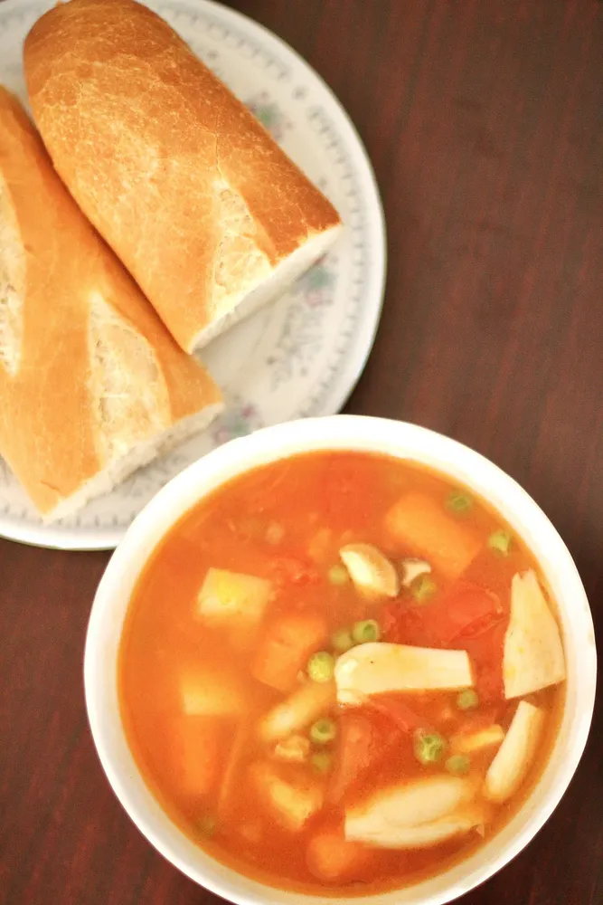 tomato tofu ragù chay with baguette
