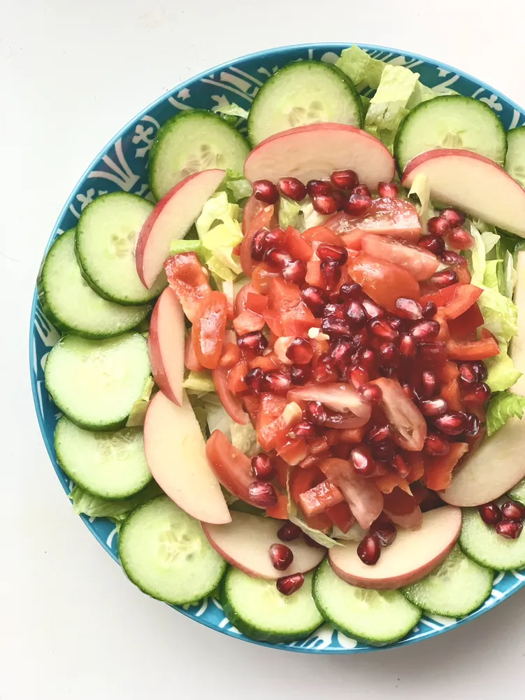 salad with pomegranate, radish and cucumber