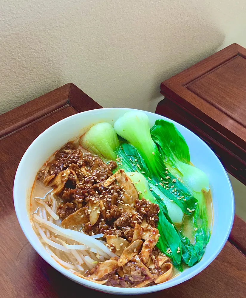 noodle bowl with bok choy and crispy shallots